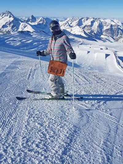 Skiing with your Vida Vida leather Satchel