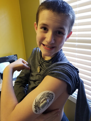 Wesley wearing Dragon Dexcom Guard ExpressionMed Overpatch