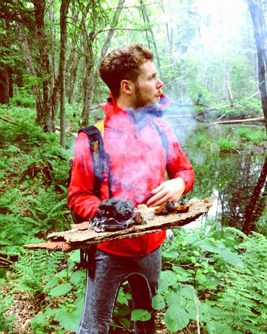 Shane Tyler Milson of Black Magic Alchemy using a Mobile Mushroom Burning Stove