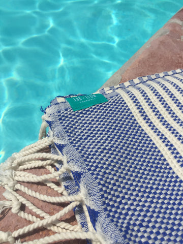 Navy Hendra hammam towel, perfect for the pool