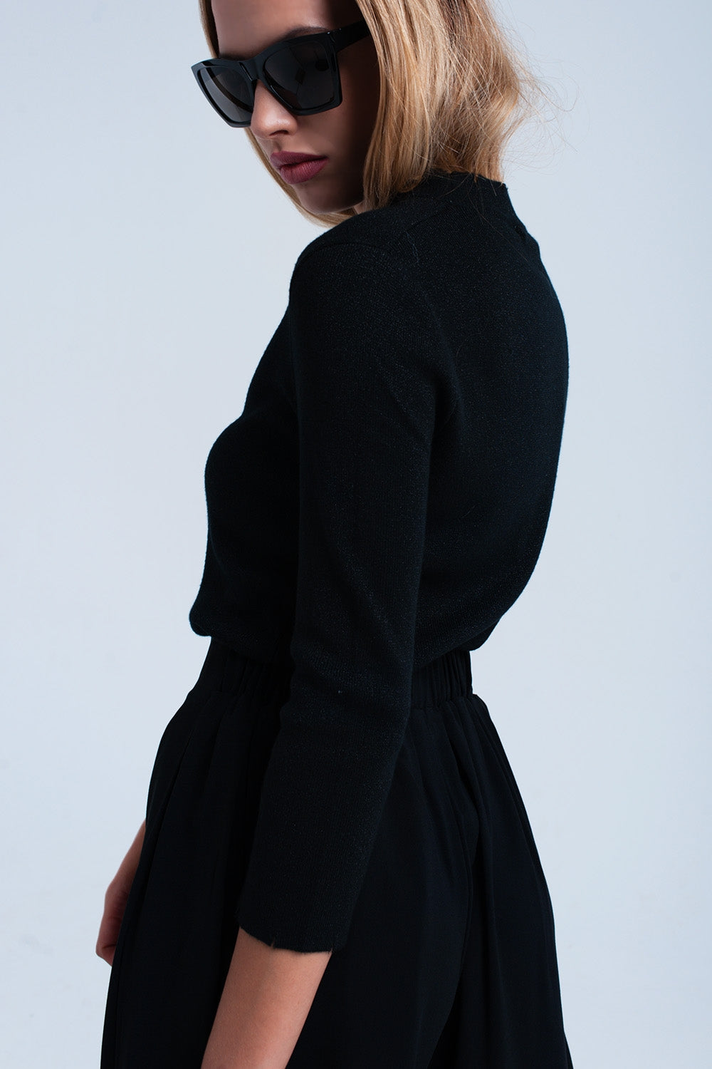 Black Shiny Sweater-Women - Apparel - Sweaters - Pull Over-Product Details Black shiny sweater with crew neckline and 3/4 sleeves in bodycon fit. It also has little cut in the hem. It's the perfect sweater to wear in any occasion. Soft woven.-Keyomi-Sook