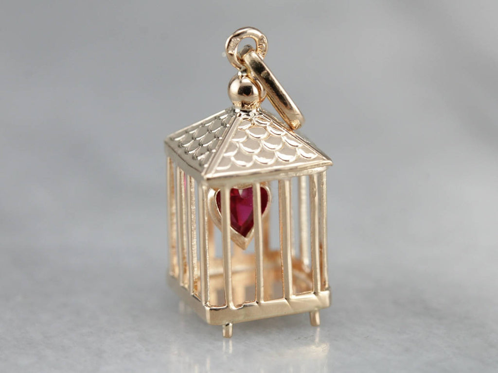 heart in a cage charm