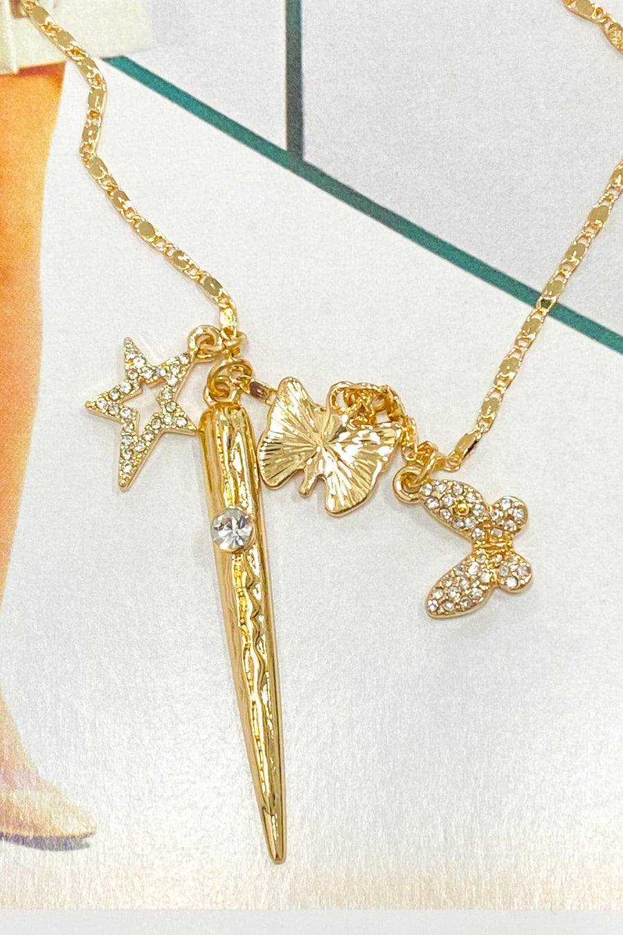 Gold Jolita Butterfly and Star Charm Necklace - kitchencabinetmagic