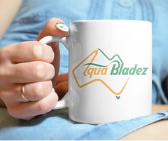 woman holding coffee cup with aqua bladez logo 