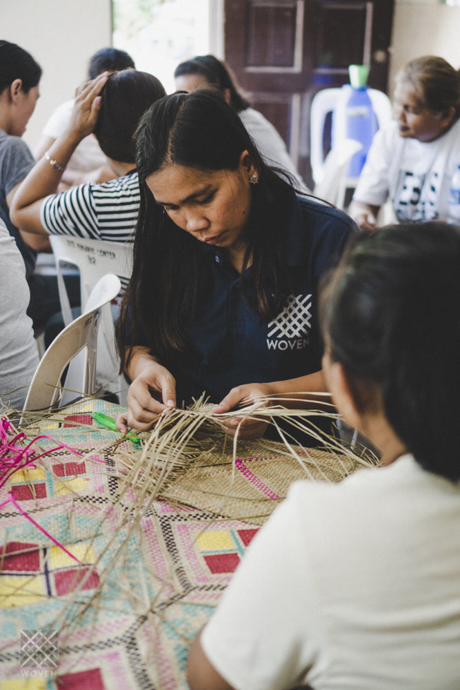 ic: Riza teaching kids how to weave at the Woven on the Move workshops in Manila