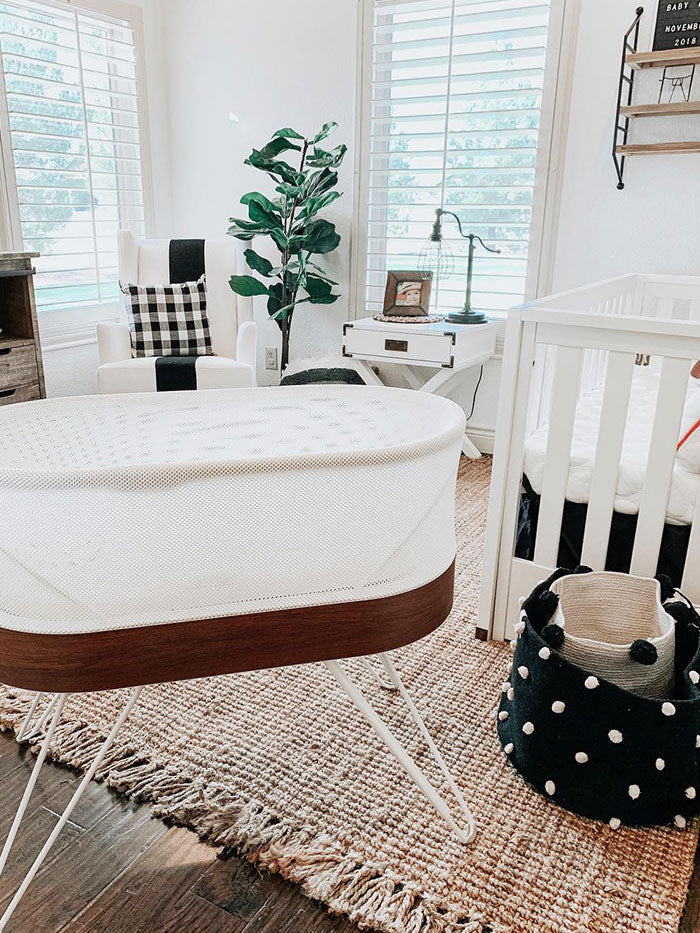 baby nursery with SNOO bassinet and black and white patterns