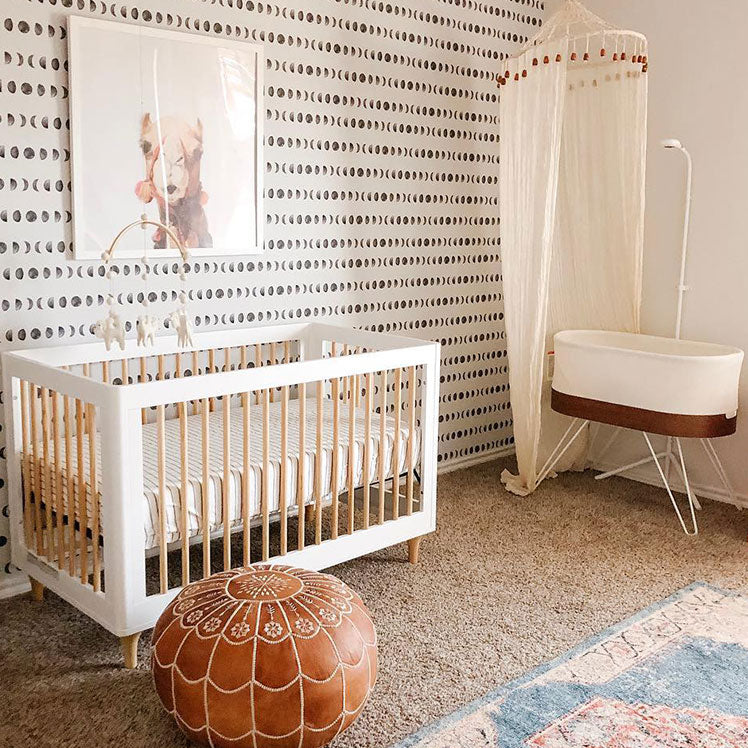 gender neutral nursery with camel picture and SNOO