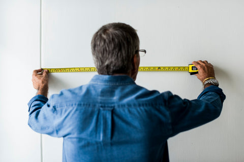 DIY man with tape measure do it yourself