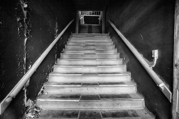 Main stairwell inside an abandoned office building