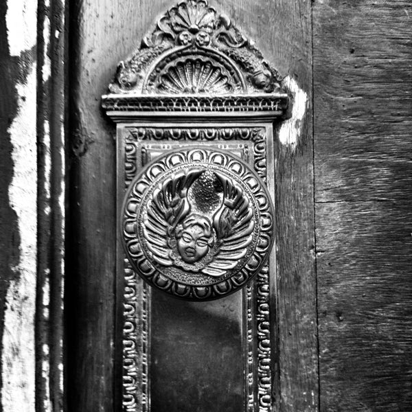 A black and white photo of an antique doorknob from Keith Dotson's Instagram feed.