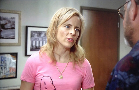 A scene from "Lady Dynamite," with Keith Dotson's photograph visible over the shoulder of actress/comedian Maria Bamford.