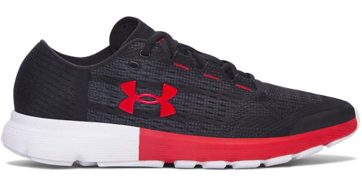 gray and red under armour shoes