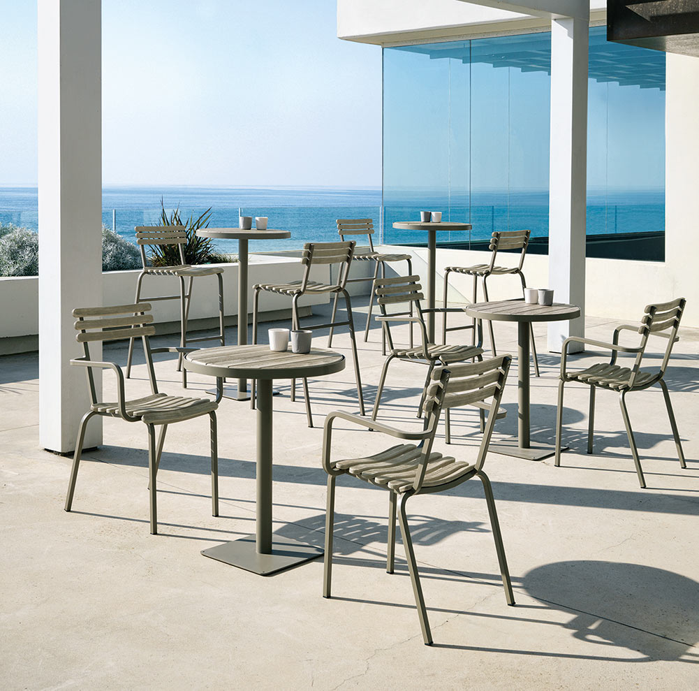 Ethimo Laren Teak Stacking Dining Chairs on outdoor patio