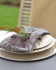 gray tablecloth with autumn leaves