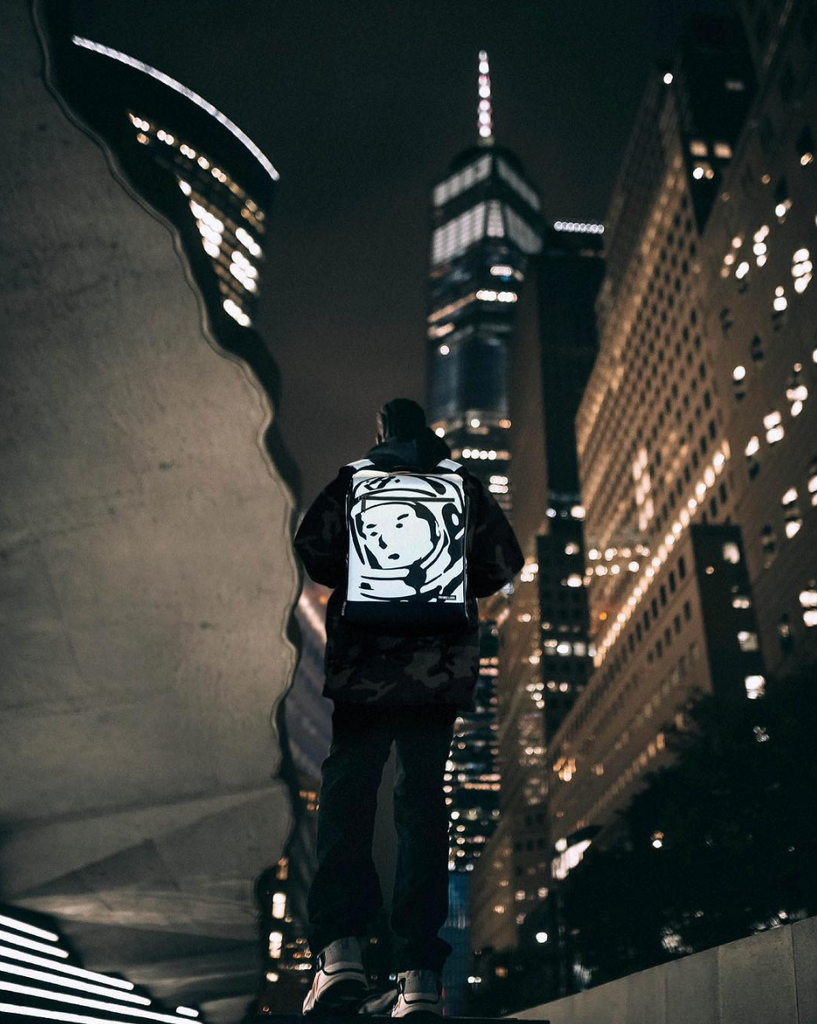 Billionaire modal wearing Boys Club Private Label - Reflective Backpack in a city