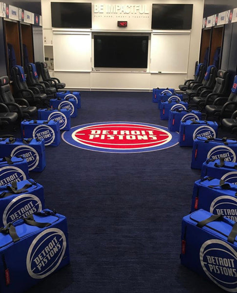 DETROIT PISTONS locker room filled with Detroit pistons private label duffles