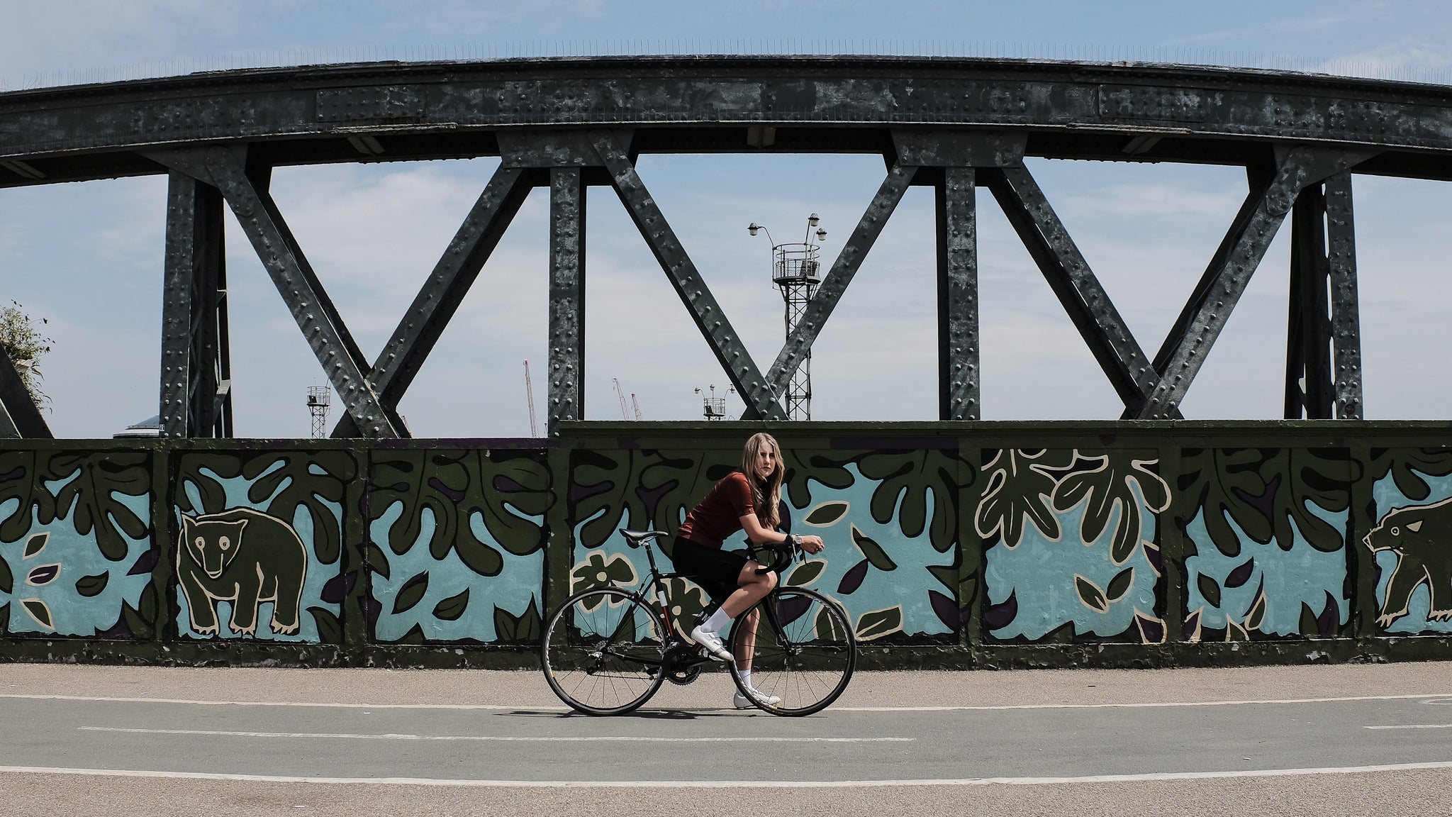 Lady on bike in Camden wearing Camden Watch Company watch