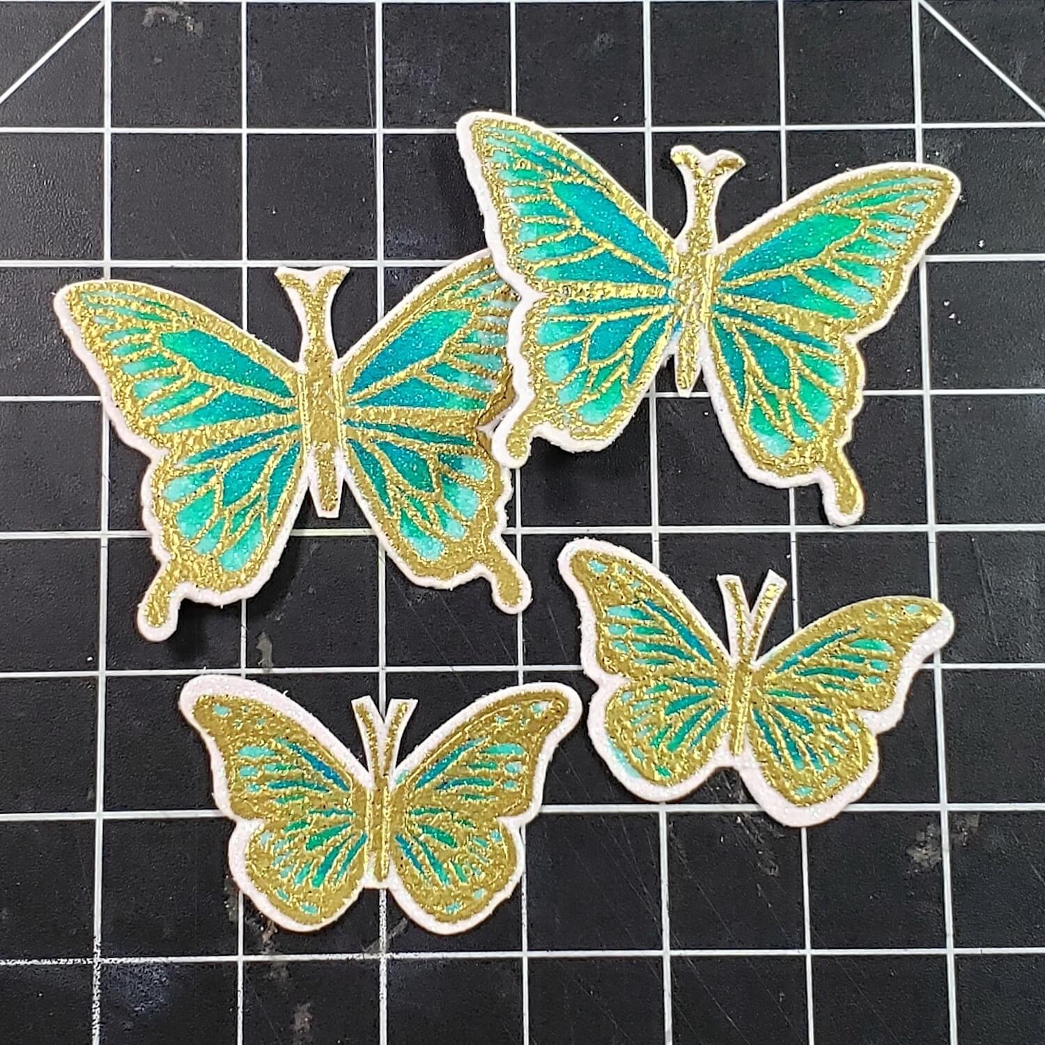 Stamped, embossed, and colored butterflies