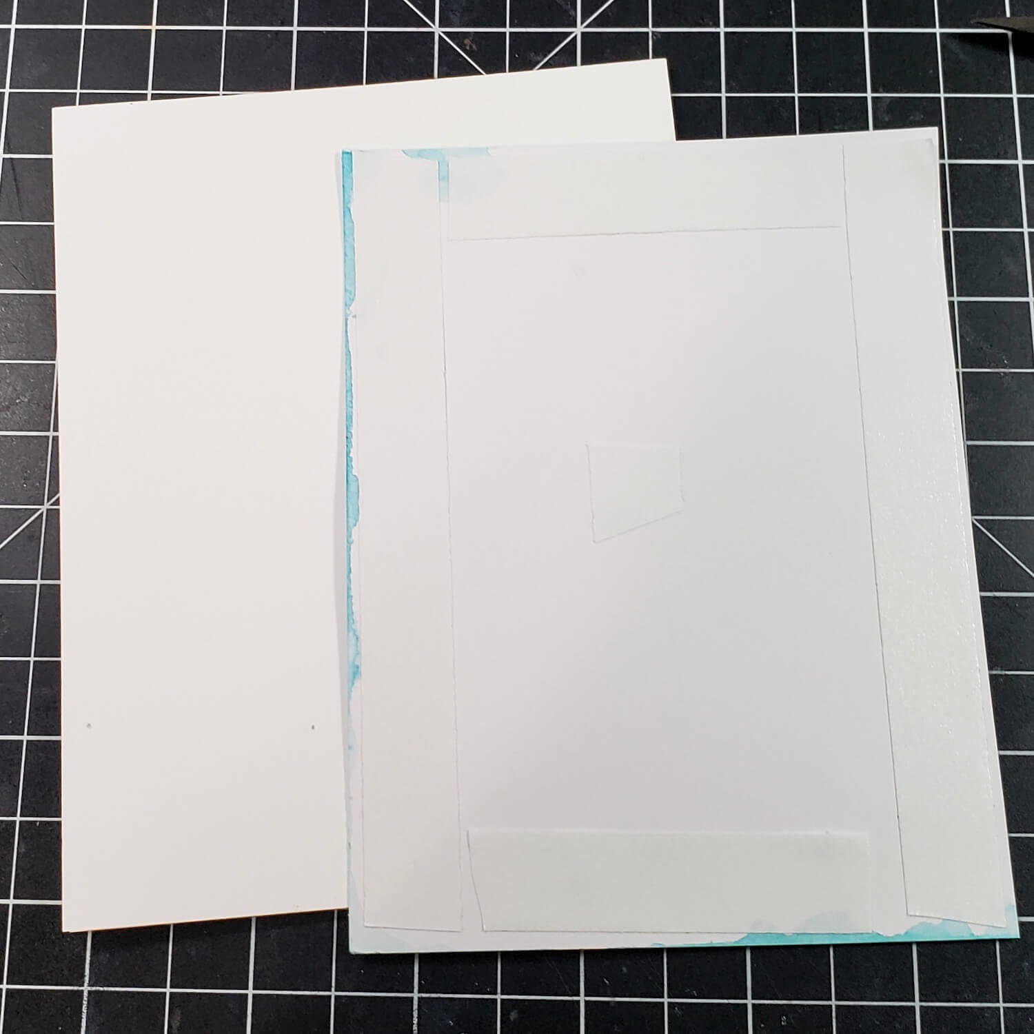 Double-sided tape on back of card panel