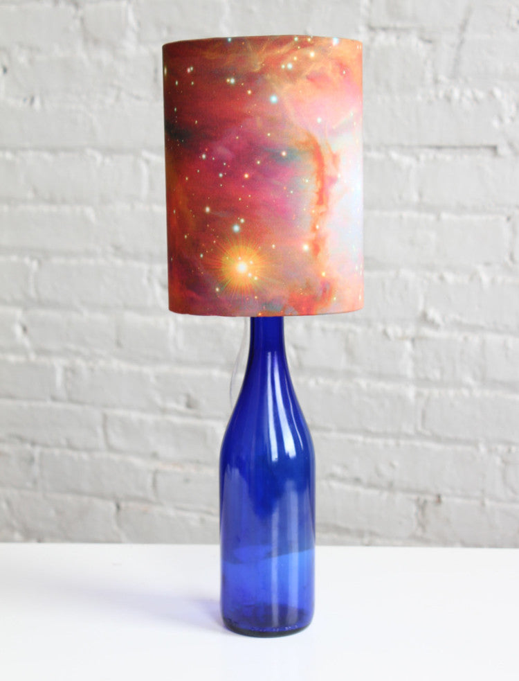 Tutorial: Bottle Lamp with Galaxy Print Shade - Read about DIY lampshade kits and projects at http://ilikethatlamp.com