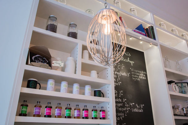Large Whisk Pendant Lamps seen at Tori More Bakeshop, as featured on Apartment Therapy