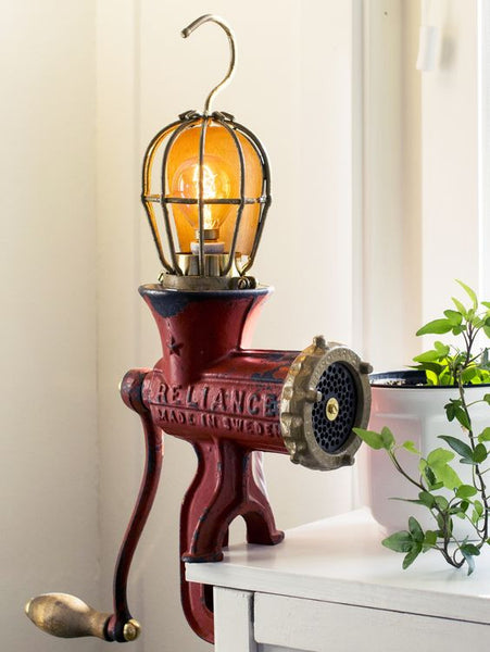 DIY Table lamp  made from a vintage red Husqvarna meat grinder and a vintage lamp cage.