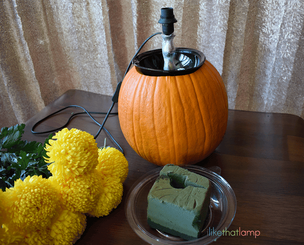 How to Upcycle an IKEA Lamp into a Floral Pumpkin Centerpiece Lamp - See the full DIY tutorial at www.ilikethatlamp.com