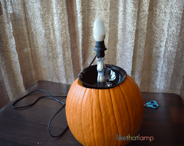 How to Upcycle an IKEA Lamp into a Floral Pumpkin Centerpiece Lamp - See the full DIY tutorial at www.ilikethatlamp.com