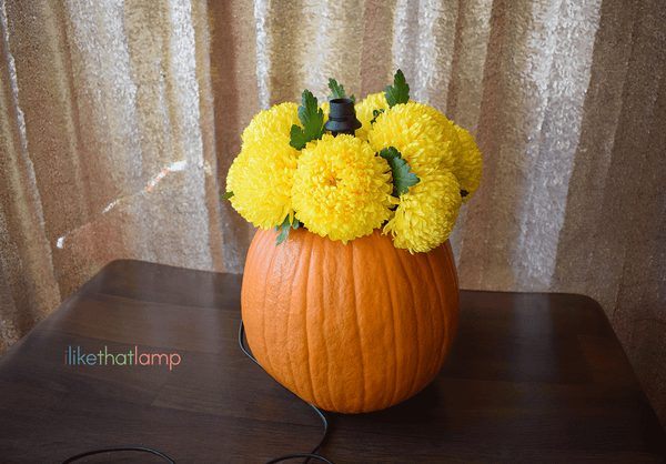 How to Upcycle an IKEA Lamp into a Floral Pumpkin Centerpiece Lamp - See the full DIY tutorial at www.ilikethatlamp.com