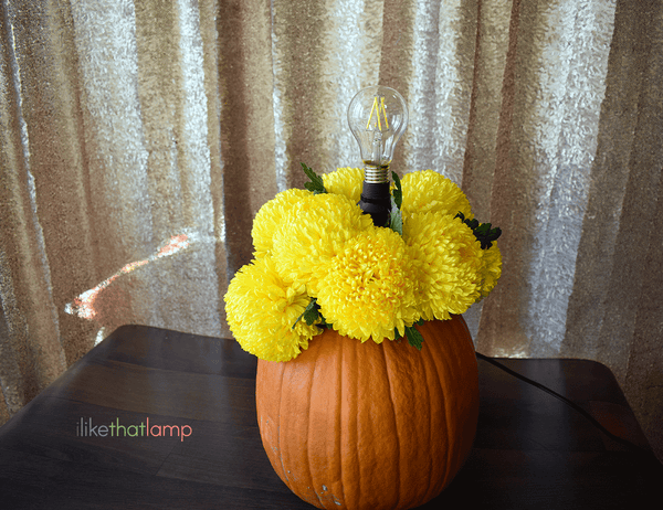 How to Upcycle an IKEA Lamp into a Floral Pumpkin Centerpiece Lamp - See the full DIY tutorial at www.ilikethatlamp.com