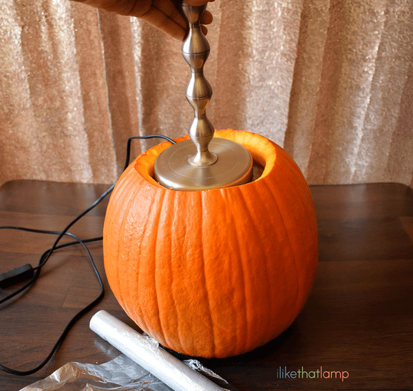 How to Upcycle an IKEA Lamp into a Floral Pumpkin Centerpiece Lamp - See the full DIY tutorial at www.ilikethatlamp.com