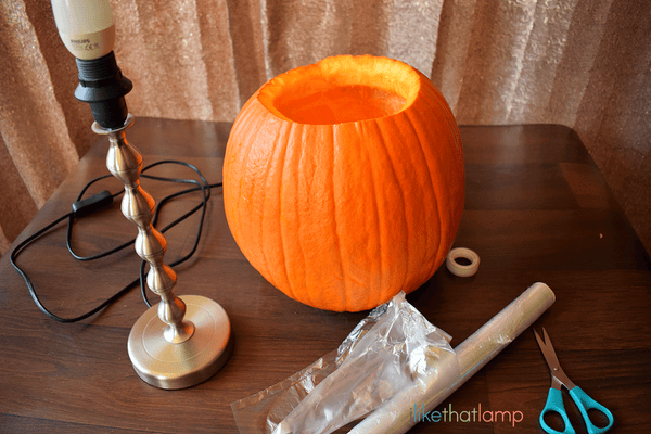 How to Upcycle an IKEA Lamp into a Floral Pumpkin Centerpiece Lamp - See the full DIY tutorial at www.ilikethatlamp.com