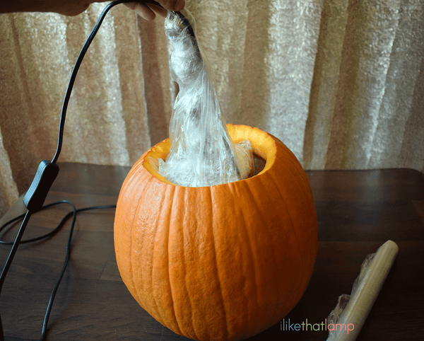 How to Upcycle an IKEA Lamp into a Floral Pumpkin Centerpiece Lamp - See the full DIY tutorial at www.ilikethatlamp.com