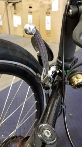 Locking e-brake handle, so the trike doesn't roll away