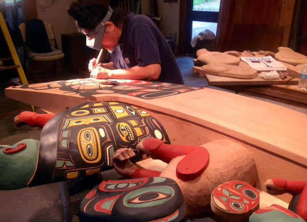 Israel Shotridge Painting the Canoe Journey Commission