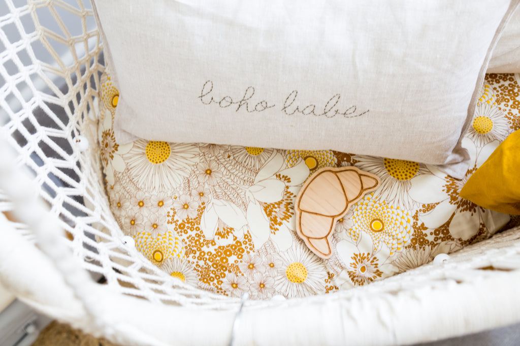 Hippie floral baby bedding with a handstitched cushion, #genderneutralnursery by littlewillowvintage