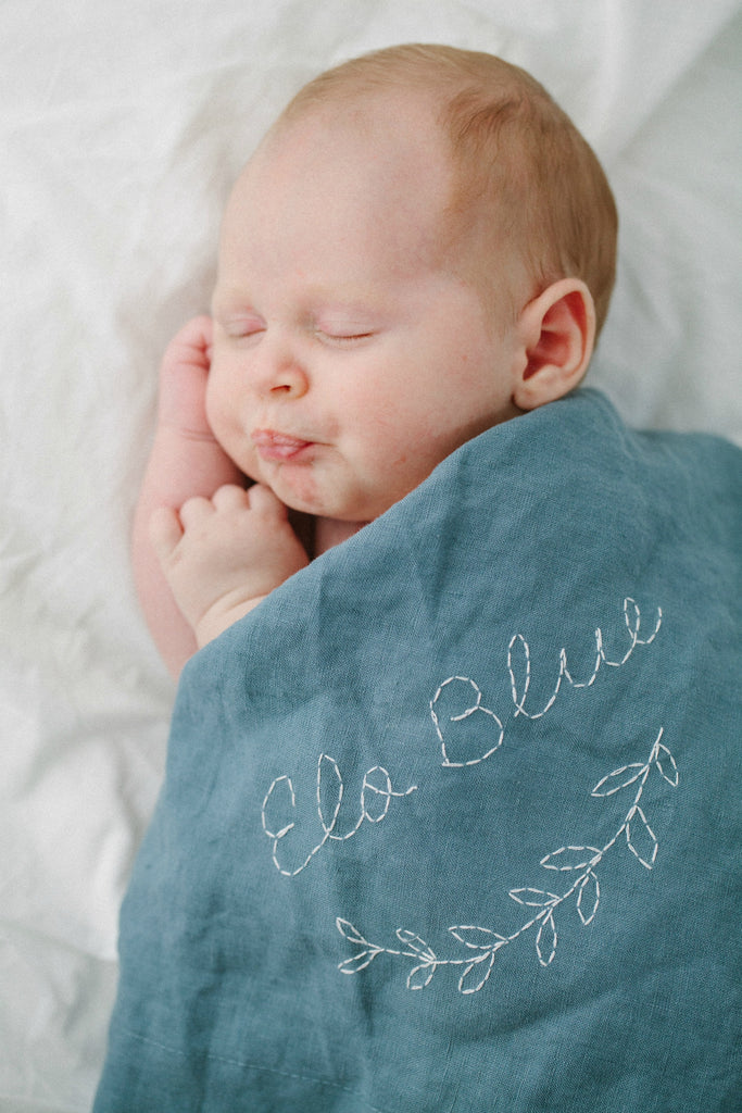 Hanstitched personalised linen baby blanket