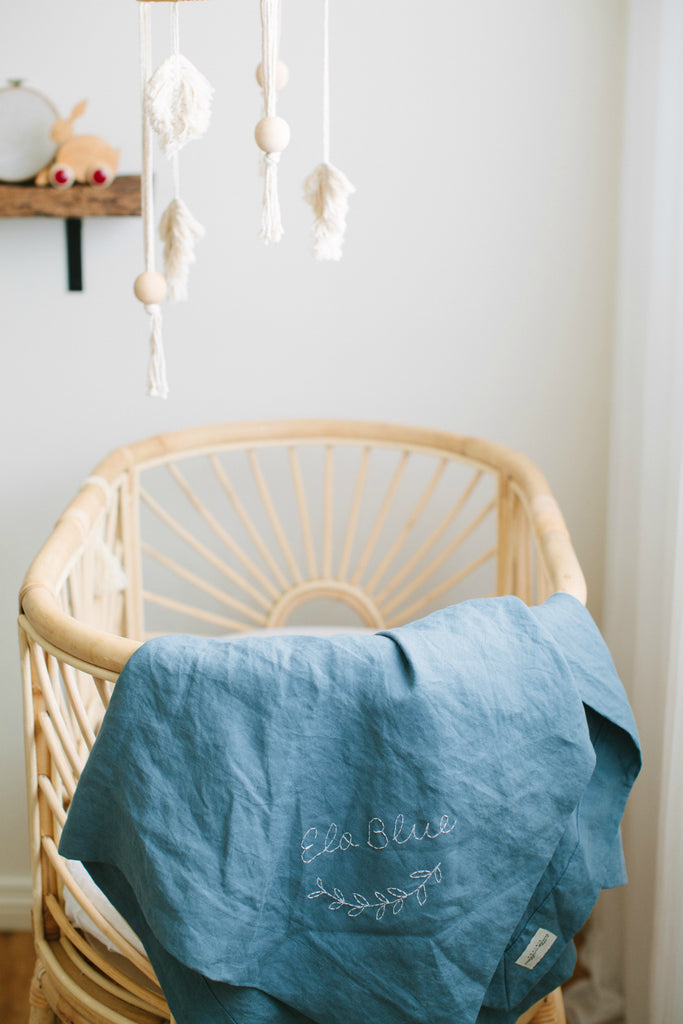 rattan crib, blue linen baby wrap, baby blanket , boys nursery 