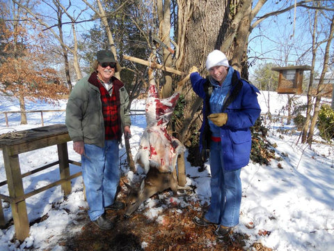 Dad and I skinning a deer in the dead of winter. It was pretty much frozen!