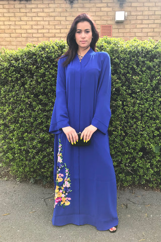 Reasons to Wear an Abaya Blue with Flowers on Hemline