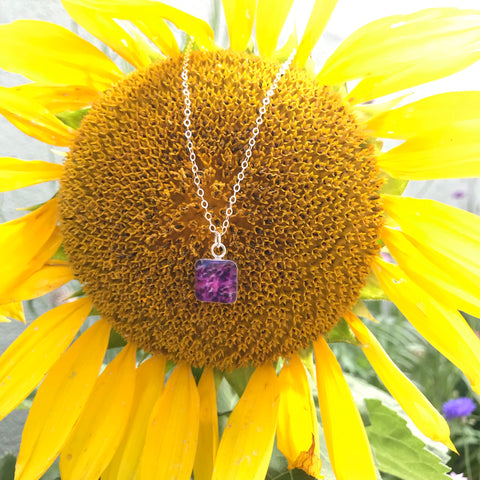 Sarcoma Alliance necklace on sunflower