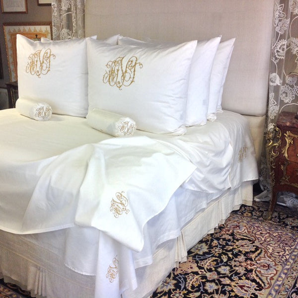 Pillow shams become decorative elements when treated to monograms, these in our Pandora Style.