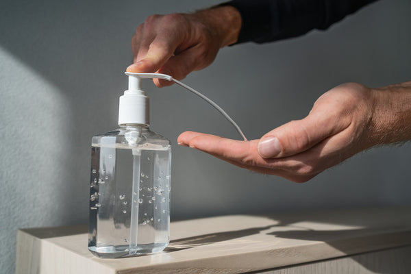 Sanitizer spraying from a hand sanitizer bottle