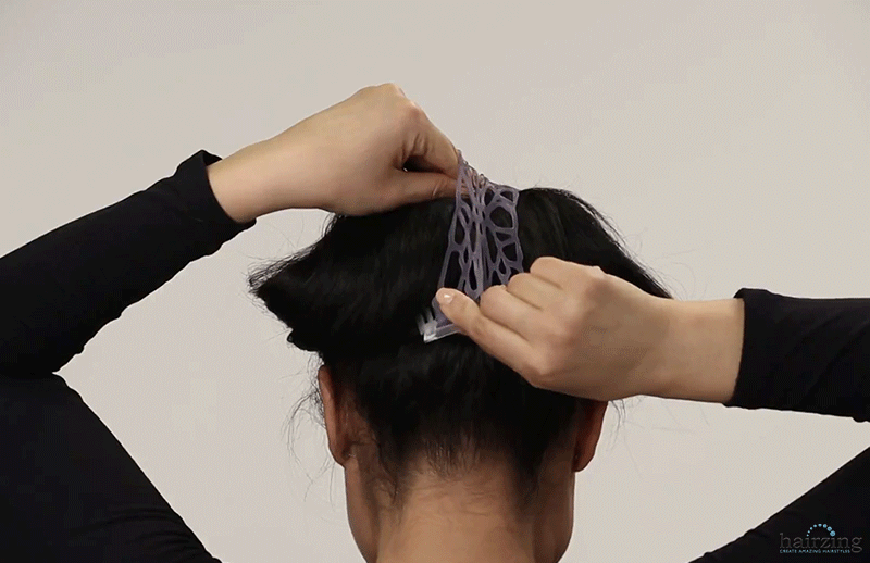 Double Bow Hairstyle Tutorial Step 6 insert HairZing on bottom to secure hold of double bow