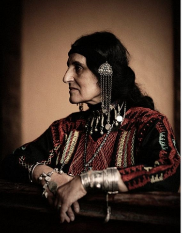 An Armenian woman wearing gypsy-style tribal stacked bracelets
