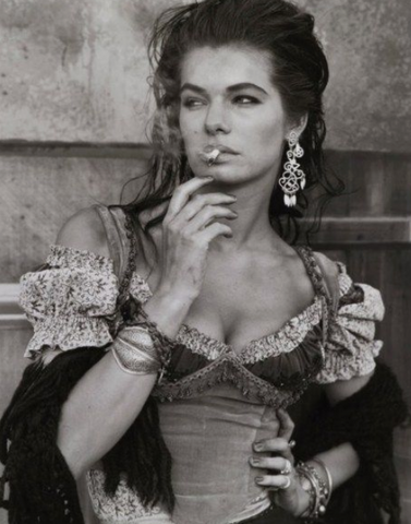 Bohemian queen in magnificent boho earrings (Photo: courtesy Herb Ritts for Gitanes)