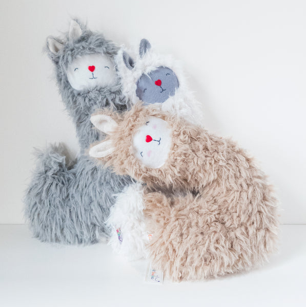 Image of 3 stuffed llama plush toys