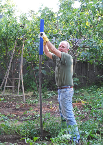 David Grau using a stake pounder