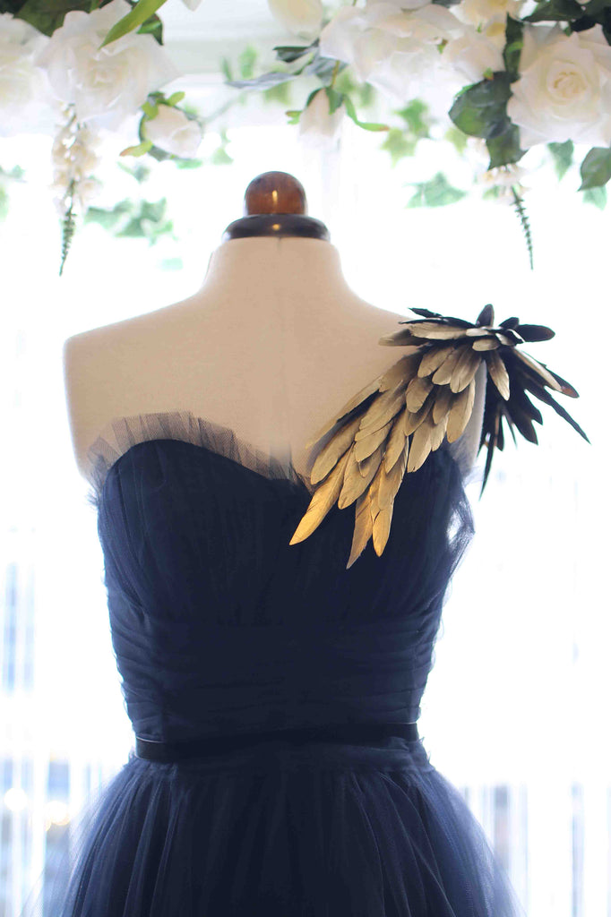 black and gold feather ballgown by Alexandra King