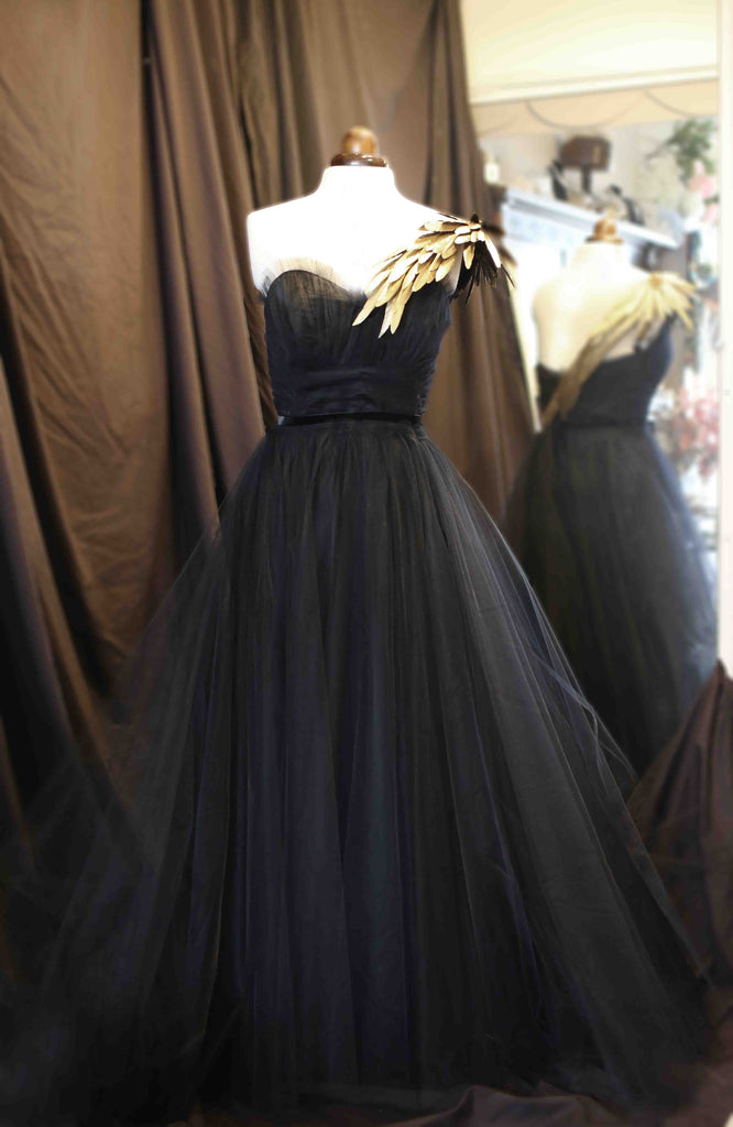 black and gold feather ballgown by Alexandra King